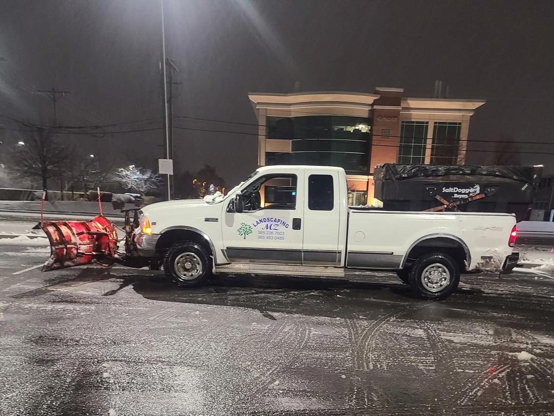 Snow plow truck snow removal service Orem Utah - Fast winter property maintenance